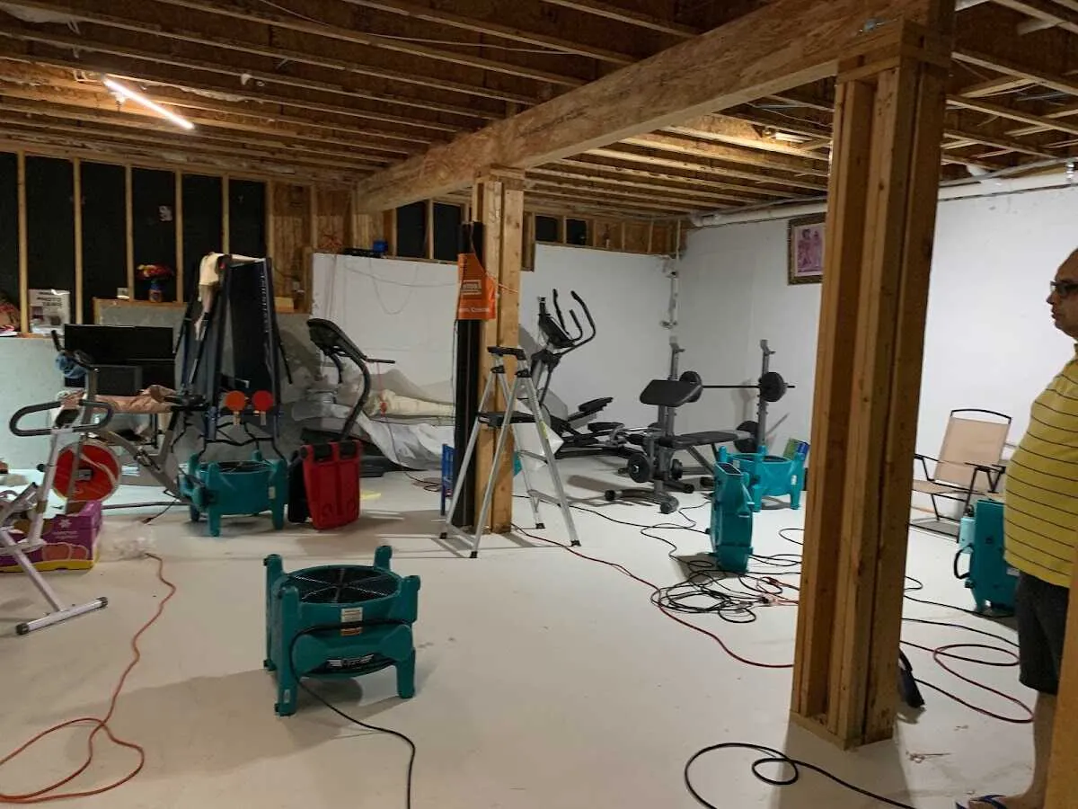 Basement drying equipment setup for Contents Cleaning & Restoration in Portage